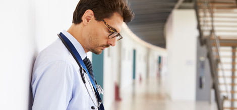Doctor standing in corridor